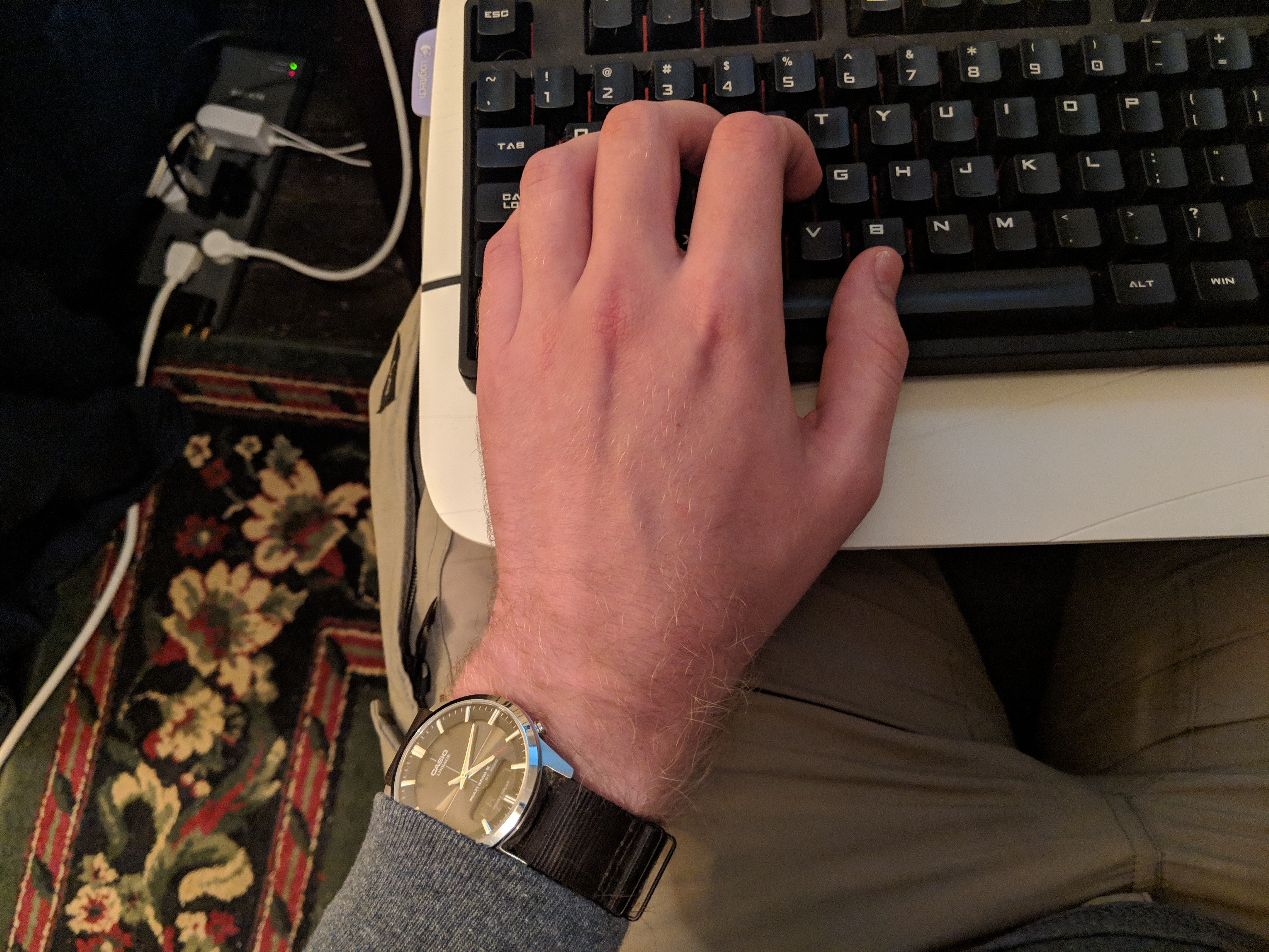 
                       Figure 1: The wrist angle is the big problem. This is my left hand shown on the home row of the CM Storm Quickfire Rapid Tenkeyless (Cherry Reds)
                  